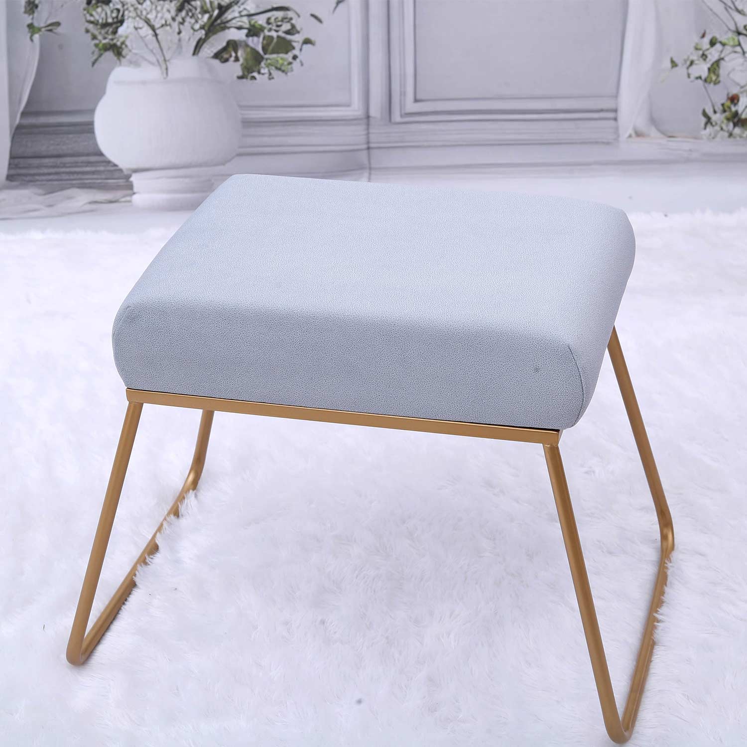 Classy and Compact Golden Metal Stool in Grey Cushion